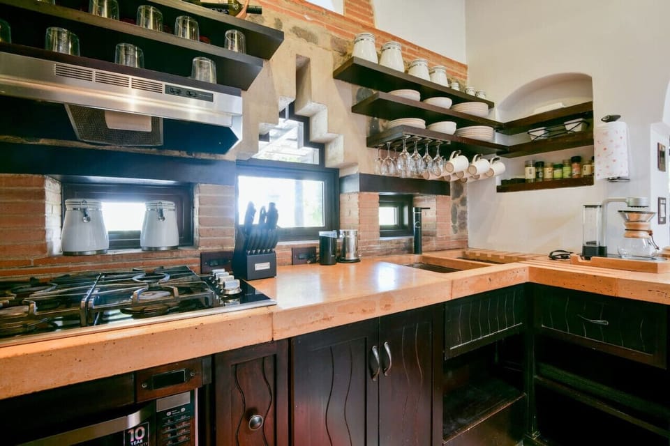 Mayan kitchen with microwave, and smart "June oven" (not seen); toaster, roasting, convection, air fry, lots of uses.