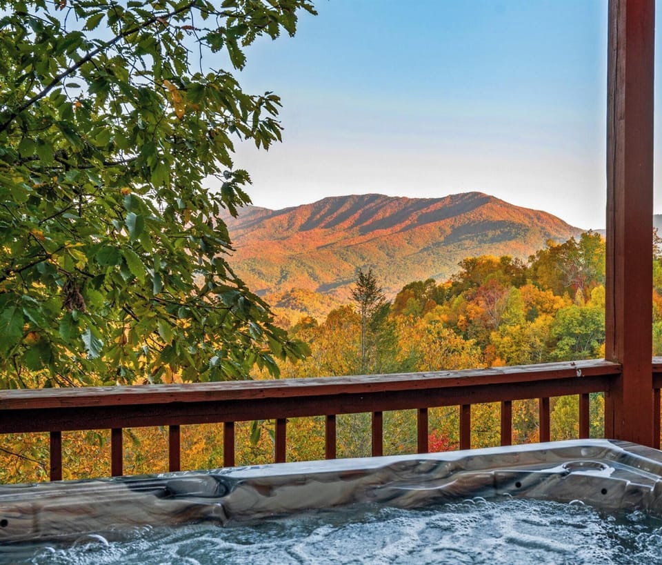 Experience ultimate relaxation as you soak away your worries and soak in the views at Heavenly Heights Mountain Retreat.