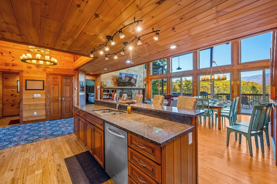 With our fully loaded kitchen boasting amazing views of the Smokies, you might even fight over who gets to prepare meals!