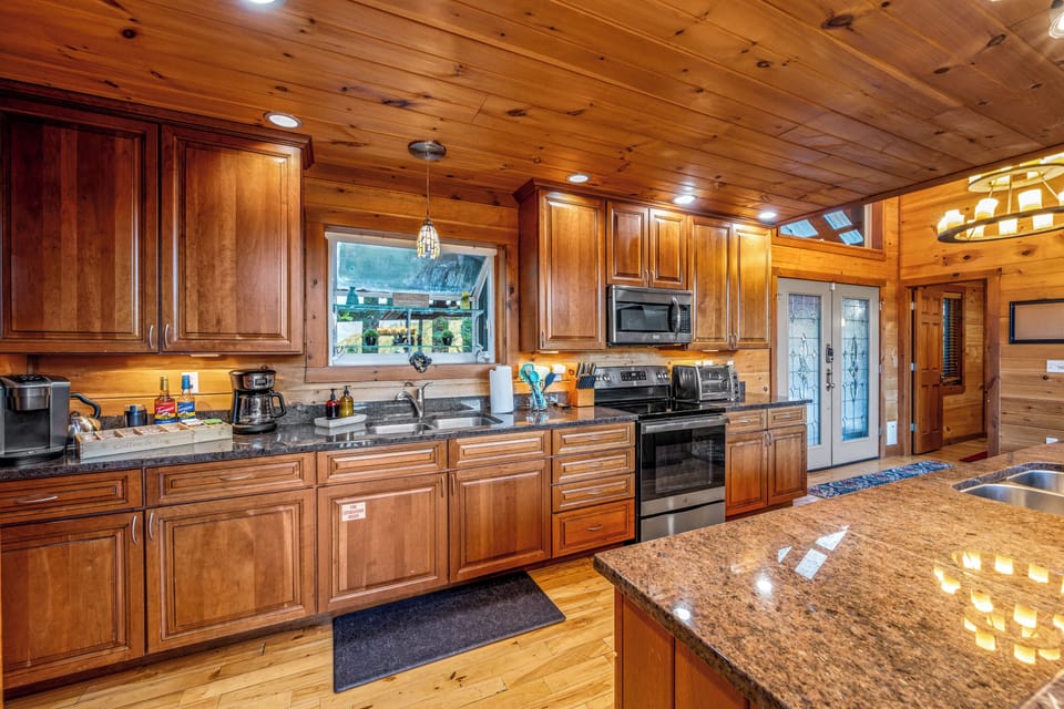 With ample countertop space and sleek stainless steel appliances, our kitchen is a chef's dream come true.