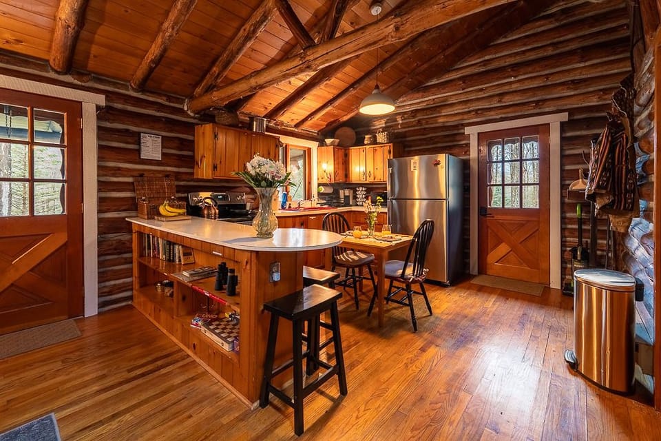 A charming, rustic kitchen equipped with modern amenities, perfect for cooking up cozy meals during your stay.
