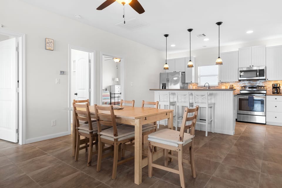 Seats 6 at the table plus 3 at the island for plenty of dining space!