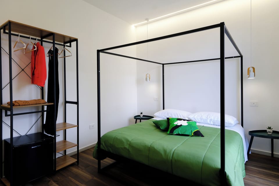 Deluxe Triple Room, Balcony, City View | Soundproofing, free WiFi