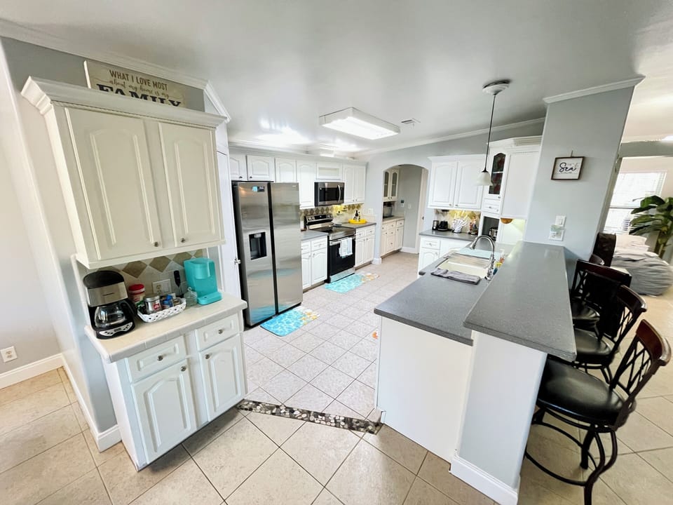 spacious kitchen w/ coffee/tea bar & everything you'll need to enjoy your coffee