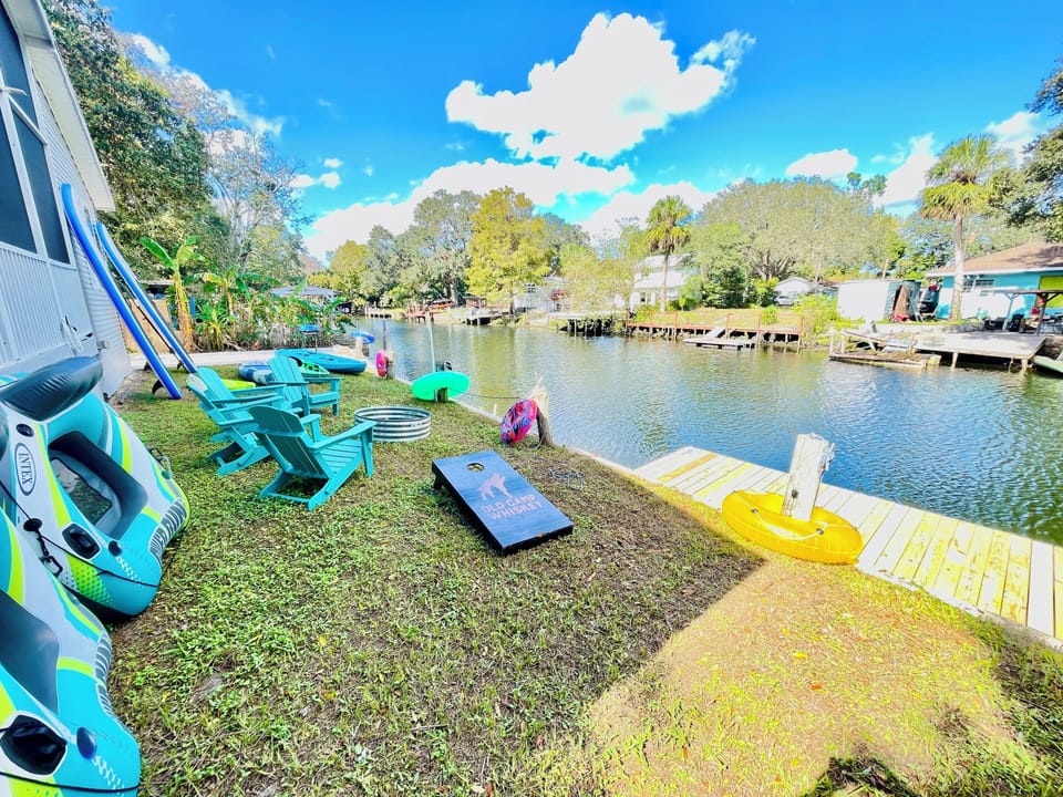 fish off the dock, sunbath, float in a tube, SUP, kayak, swim, play corn hole 