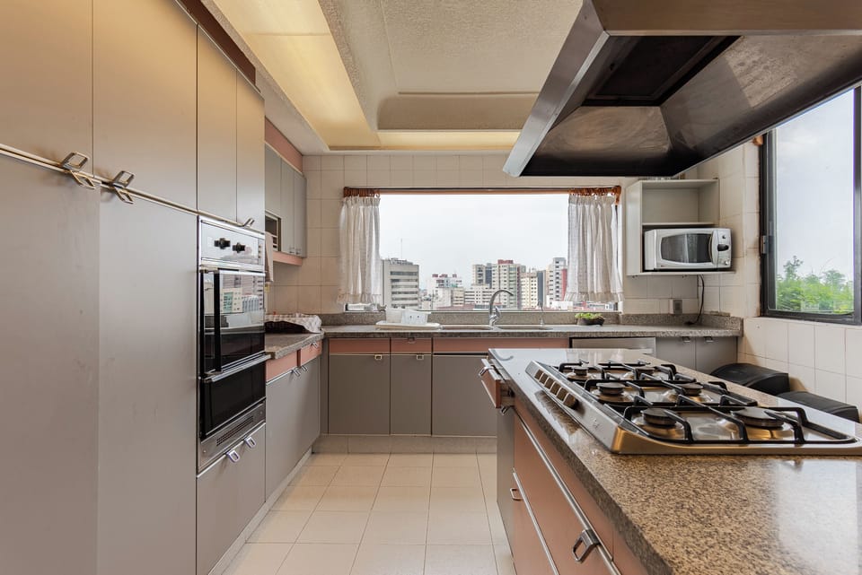 Luxury Apartment, City View | Private kitchen | Full-size fridge, microwave, stovetop, electric kettle