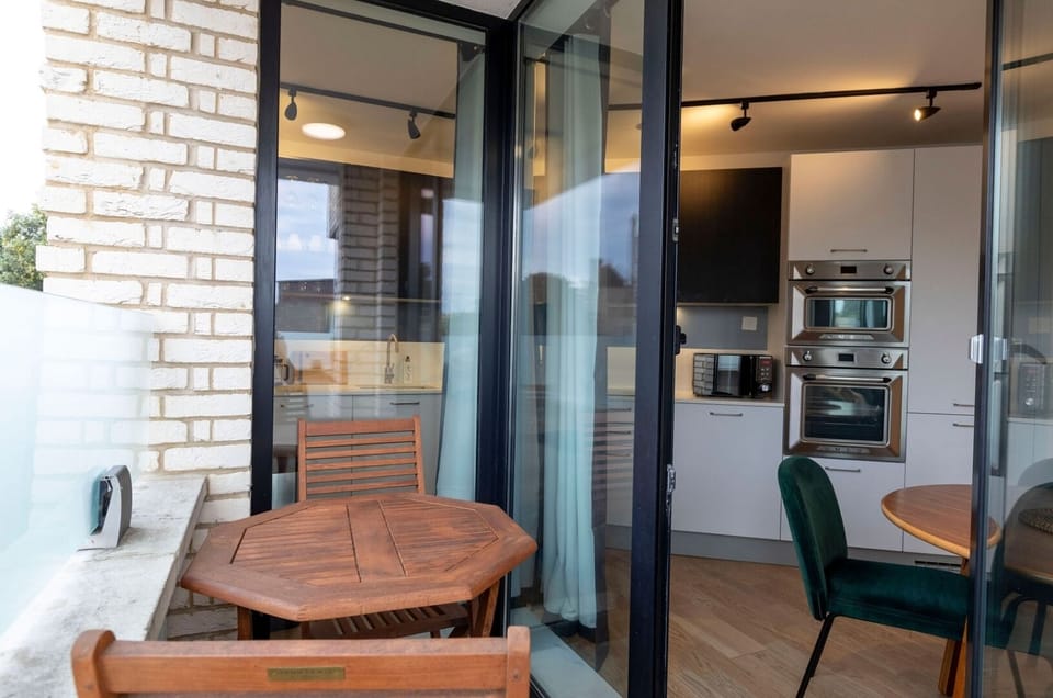 Private balcony with table and 2 chairs