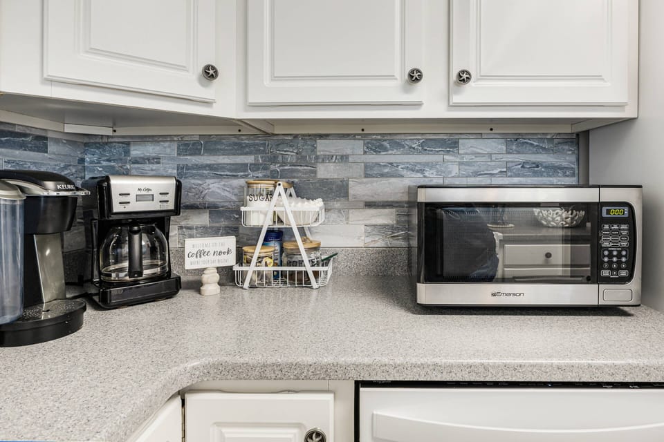 A Keurig coffee maker and a Mr. Coffee drip coffee maker, ideal for brewing a morning cup.