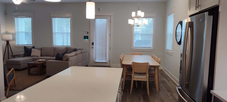 Enjoy the ease and elegance of open-concept living, where the kitchen, and dining areas, come together for effortless entertaining.