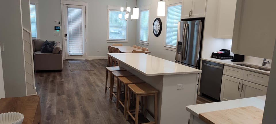 Gather around our spacious island with high seating—perfect for meals, conversations, or enjoying a morning coffee.