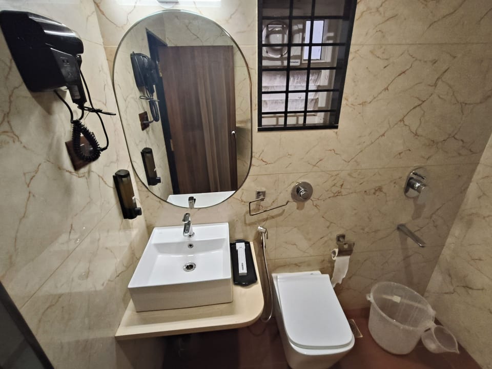 Standard Double Room | Bathroom | Shower, towels, soap, shampoo