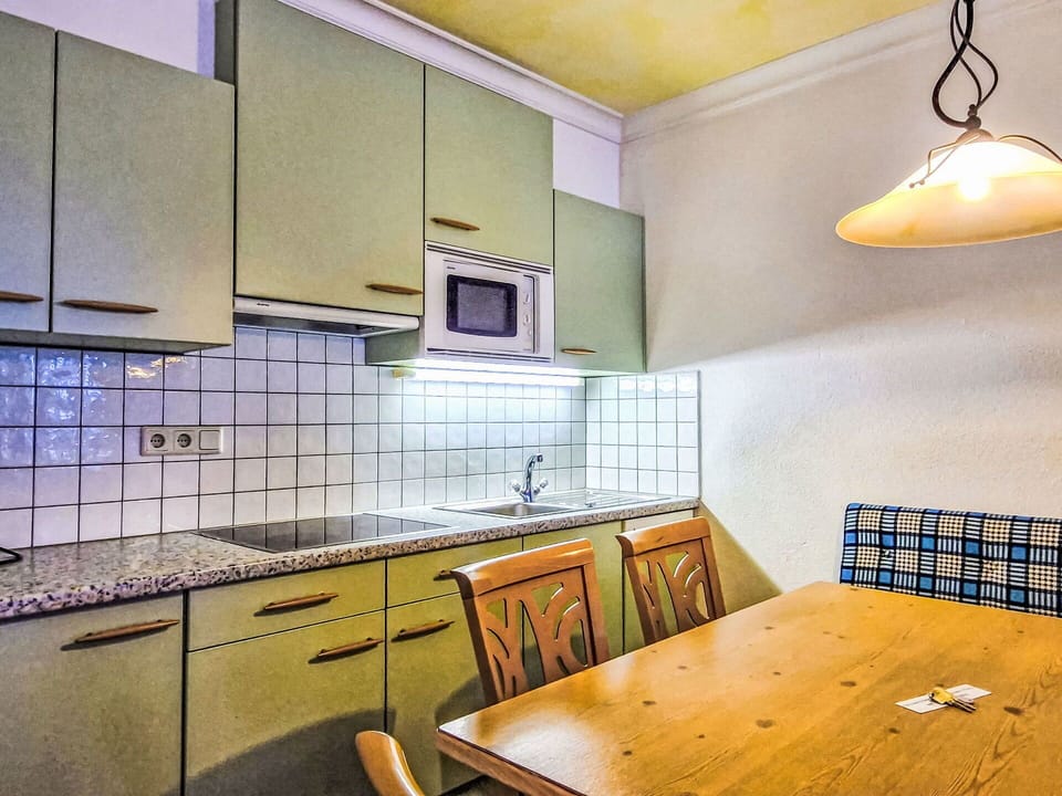 Interior Design, Flooring, Ceiling, Floor, Room, Lighting, Apartment, Light Fixture, Countertop, Cabinetry