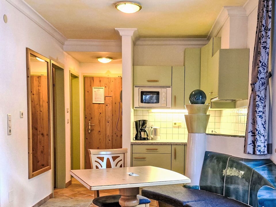 Interior Design, Furniture, Flooring, Wood, Floor, Ceiling, Room, Lighting, Apartment, Chair