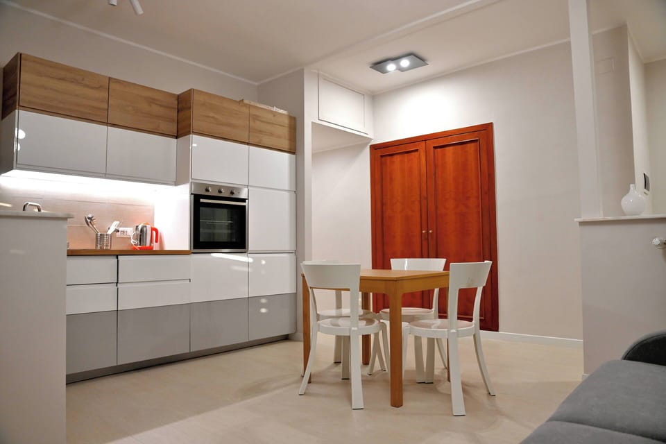 Apartment, Balcony, City View | Private kitchen | Fridge, oven, stovetop, dishwasher