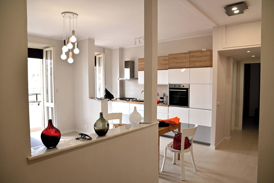 Apartment, Balcony, City View | Living area | 32-inch flat-screen TV with cable channels
