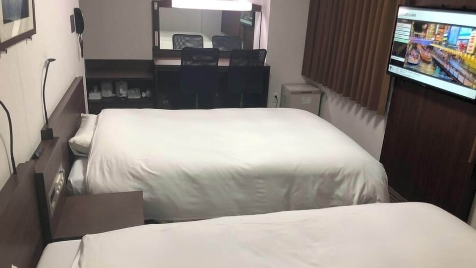 Desk, blackout drapes, soundproofing, free WiFi