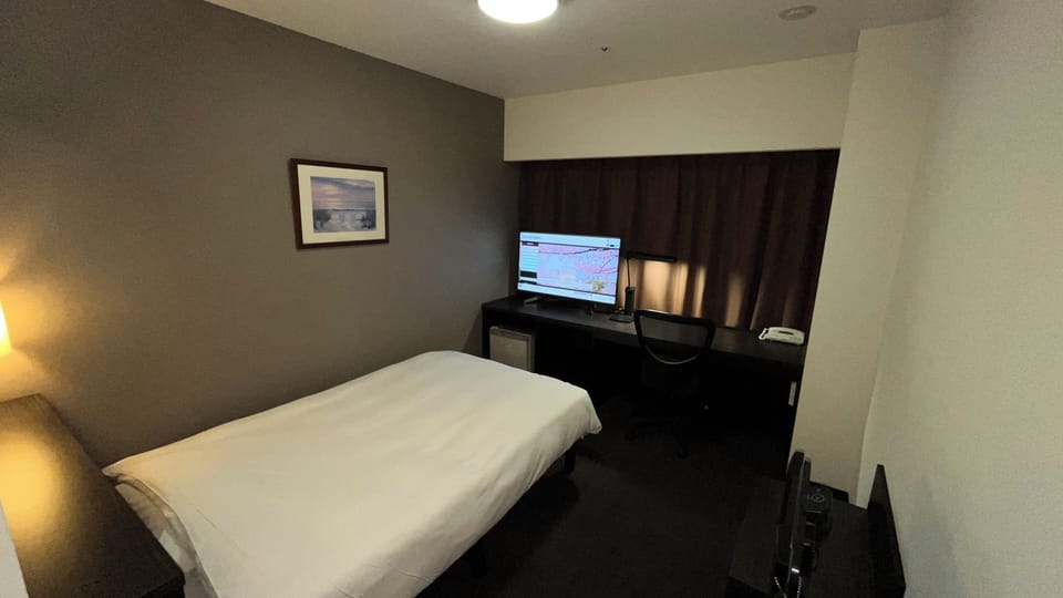 Desk, WiFi (free), bed sheets