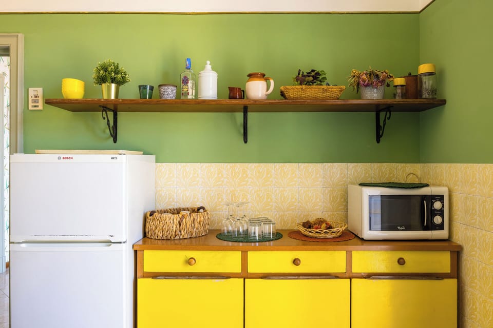 Design Apartment, 2 Bedrooms, 2 Bathrooms, City View | Private kitchen | Full-size fridge, microwave, espresso maker, coffee/tea maker