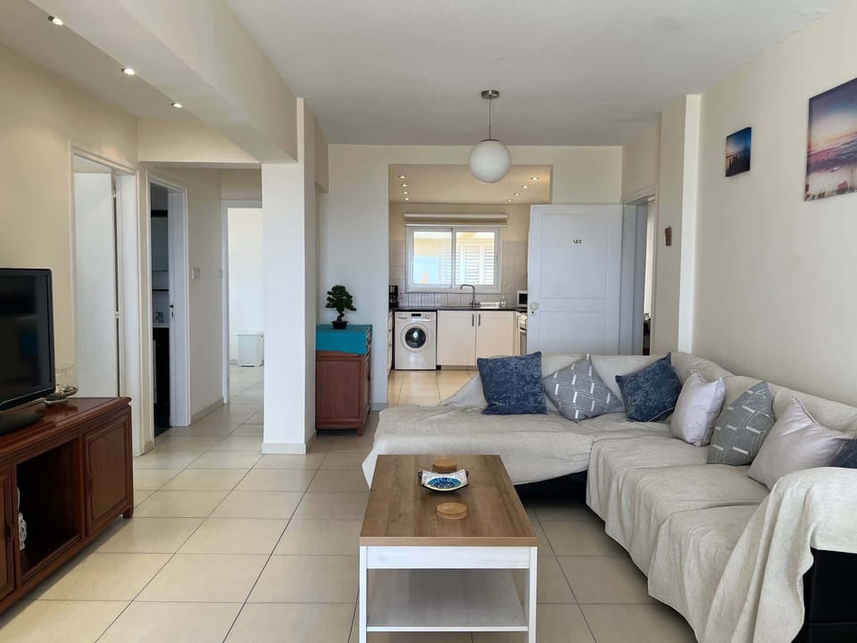 Open plan living area with 2nd and 3rd bedroom access