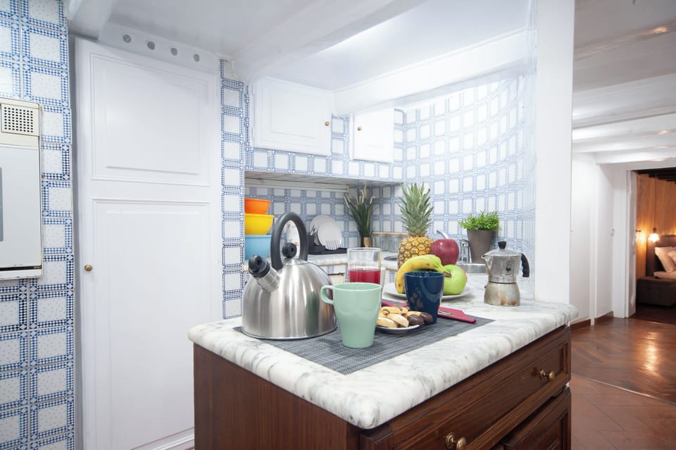 Apartment, City View | Private kitchen | Full-size fridge, stovetop, electric kettle