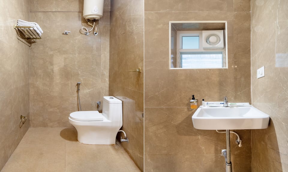 Deluxe Double Room, City View | Bathroom | Shower, towels, soap, toilet paper