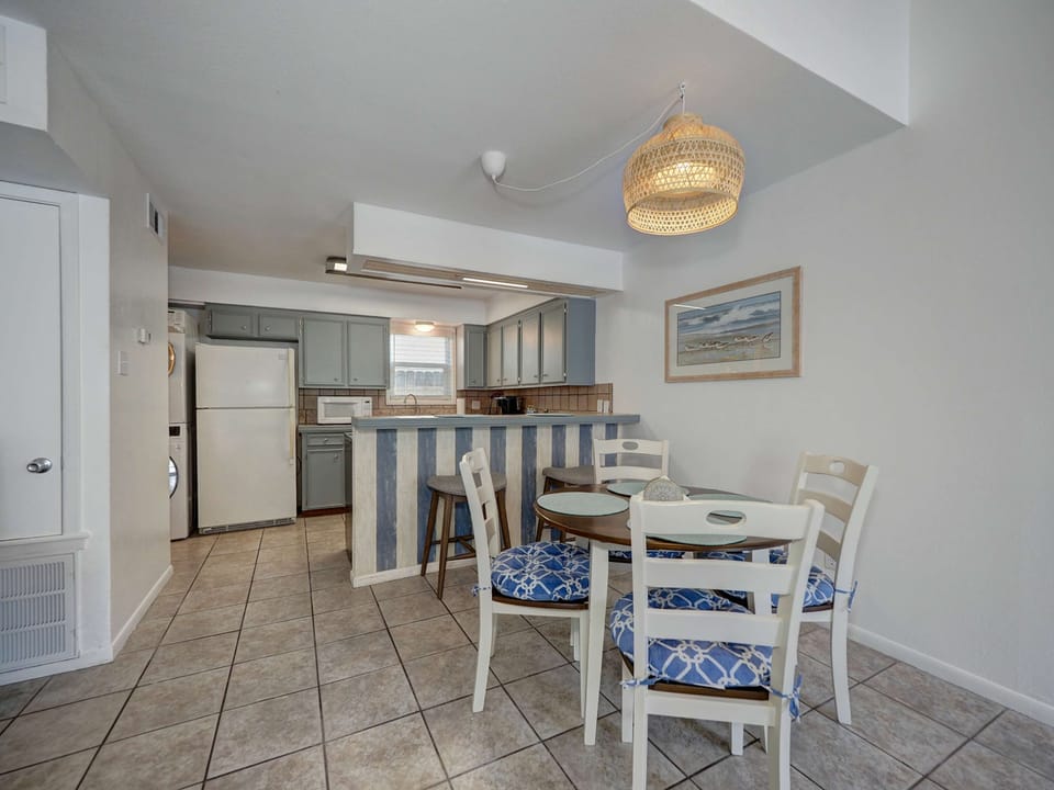 Gather around the dining table for four, perfectly complemented by a fully stocked kitchen ready for all your culinary adventures!