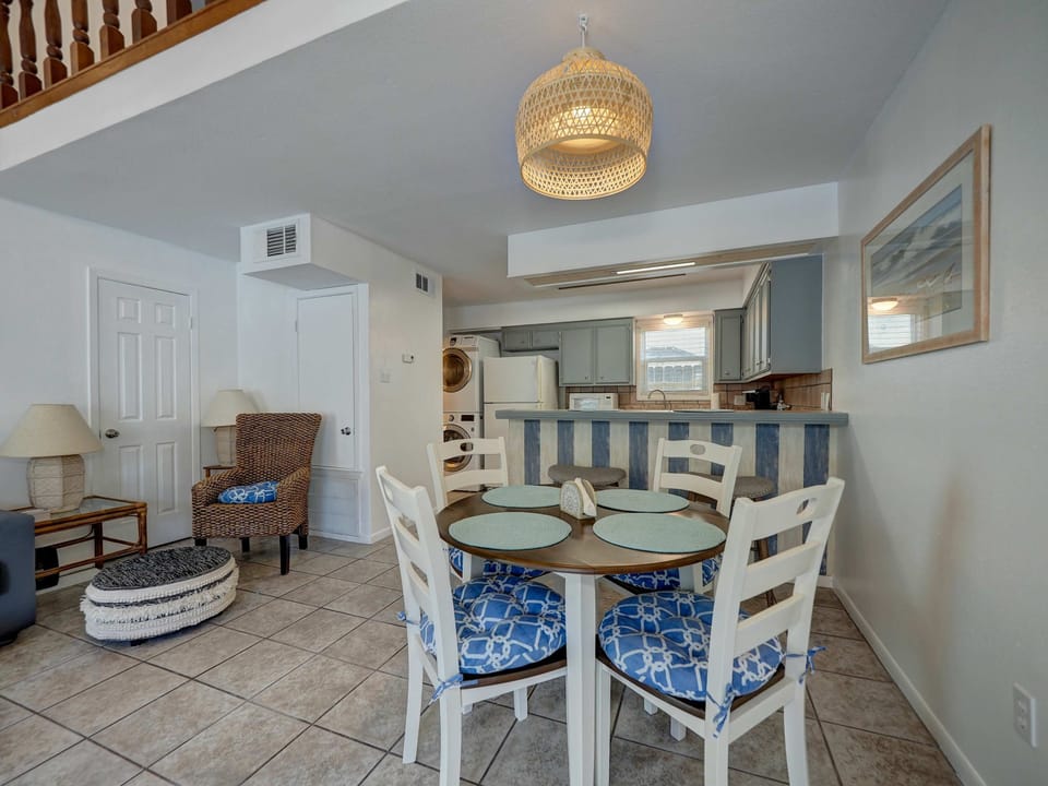 Gather around the dining table for four, perfectly complemented by a fully stocked kitchen ready for all your culinary adventures!
