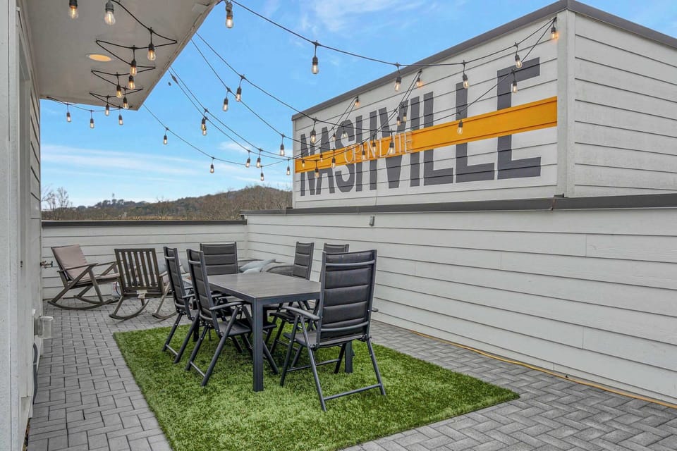 4th floor. Rooftop patio with TV, string lights, firepit, BBQ grill