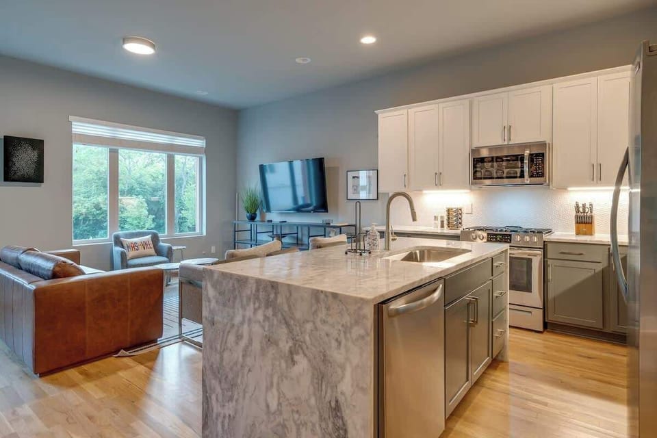 2nd floor. Kitchen and living room space. Island seats 4