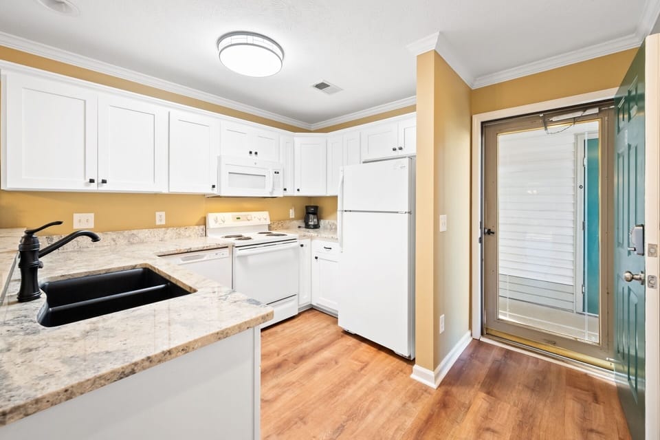 Condo, 2 Bedrooms | Private kitchen | Coffee/tea maker, fridge, oven, toaster