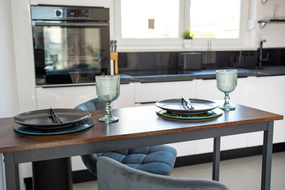 Comfort Apartment, 2 Bedrooms | Living area | 32-inch TV with satellite channels