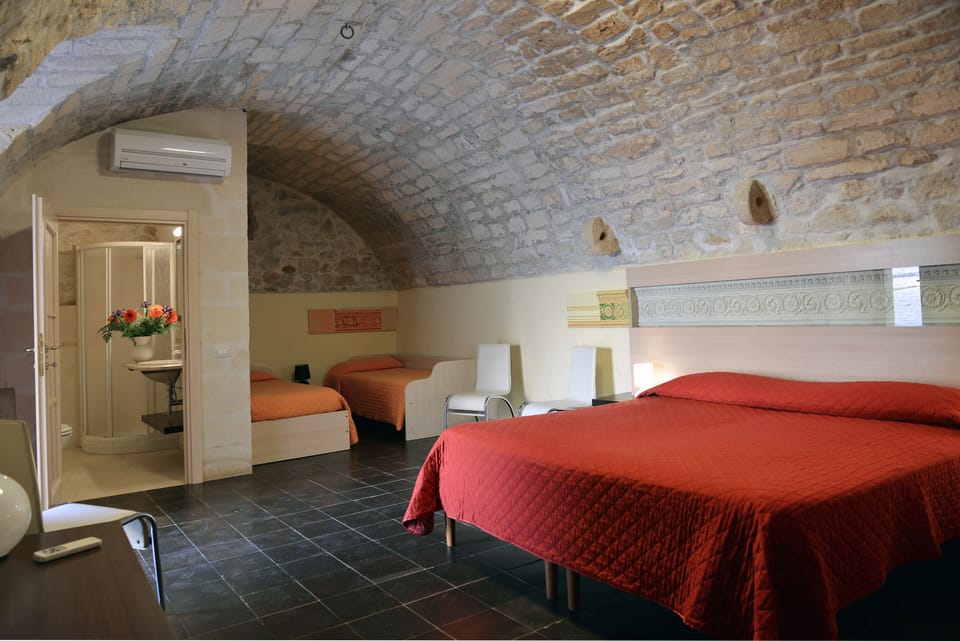 Quadruple Room | Premium bedding, minibar, desk, soundproofing