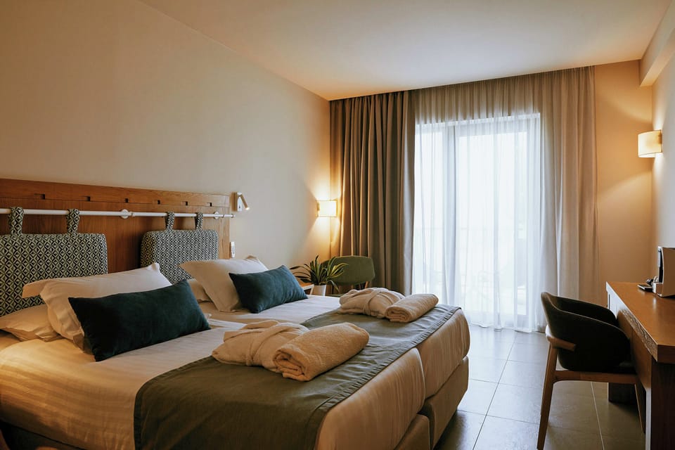 Superior Double Room Side Sea View Shared Pool | Premium bedding, minibar, in-room safe, desk