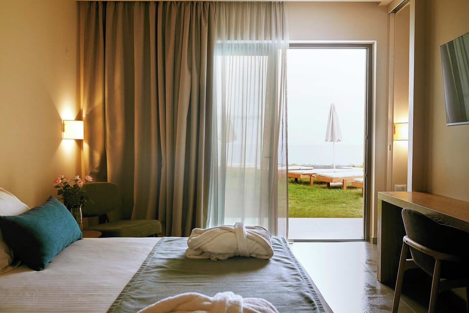 Superior Double Room Side Sea View Shared Pool | Premium bedding, minibar, in-room safe, desk
