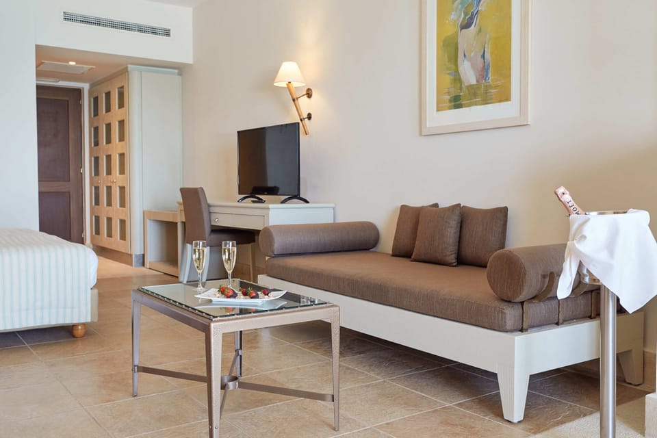 Junior Suite, Beachfront (Sharing Pool -AD) | Premium bedding, minibar, in-room safe, desk