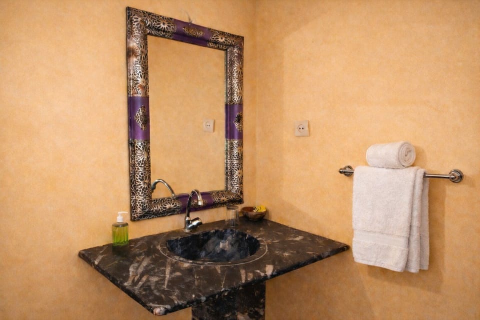 Basic Triple Room | Bathroom | Shower, towels, soap, toilet paper