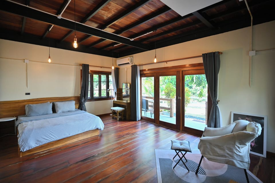 Deluxe Room, Balcony, Mountain View | In-room safe, iron/ironing board, free WiFi