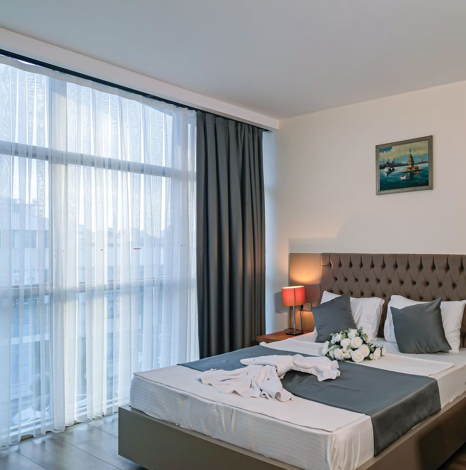 Standard Double Room, City View | In-room safe, desk, laptop workspace, soundproofing