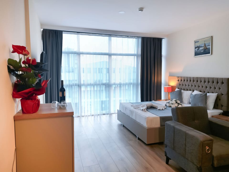 Family Suite, City View | In-room safe, desk, laptop workspace, soundproofing