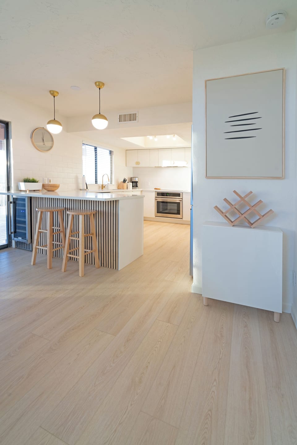 Modern kitchen with all the essentials. Filtered water, drip coffee, wine fridge