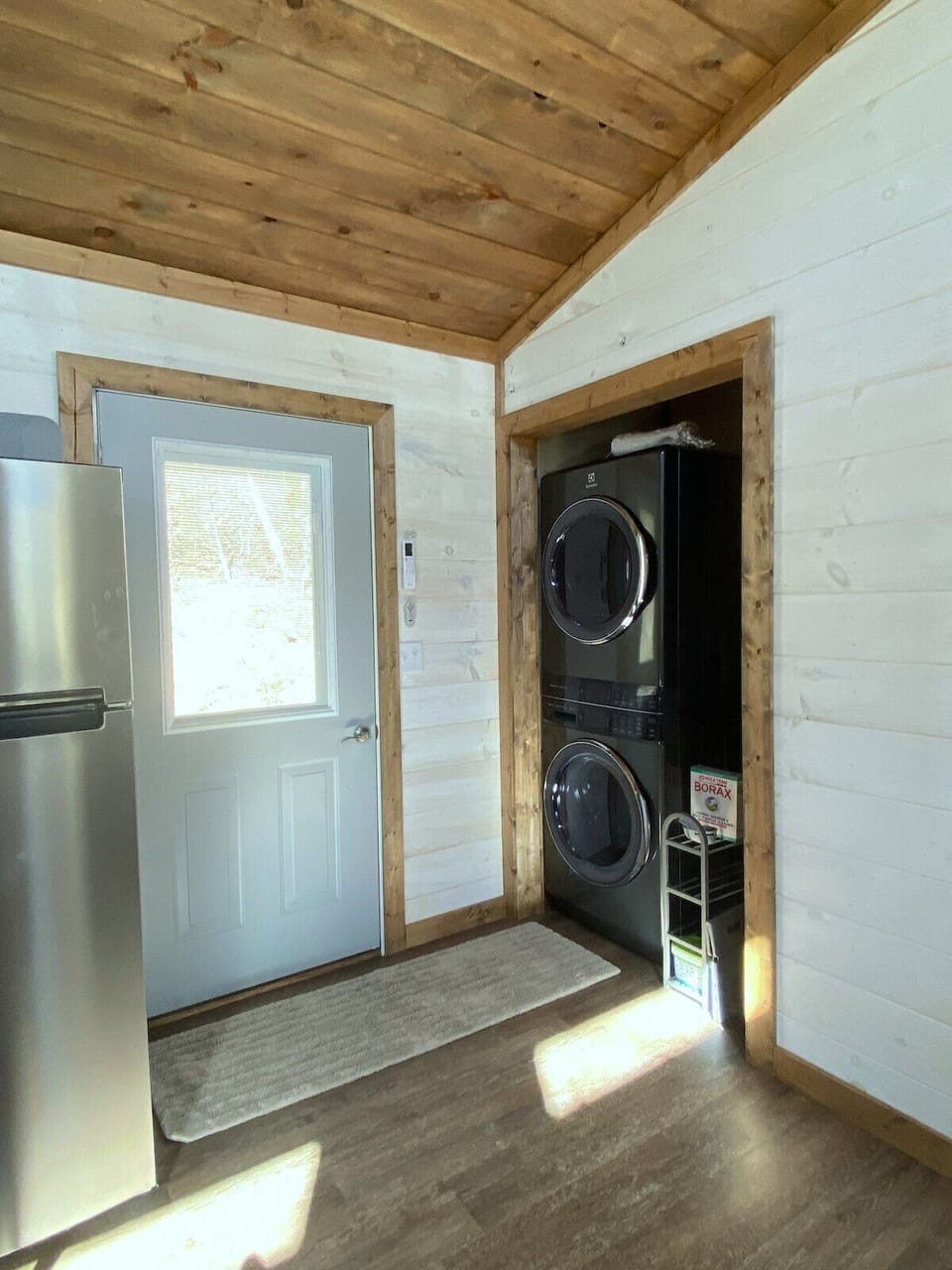 Laundry area with large capacity washer and dyer. 