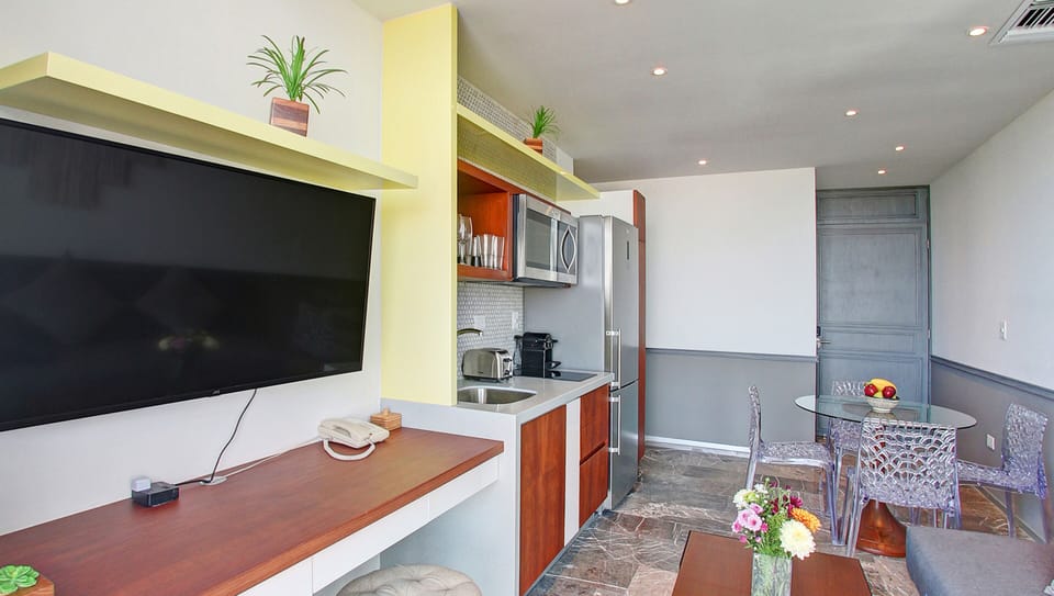 Apartment, Balcony, City View | Living area | Smart TV