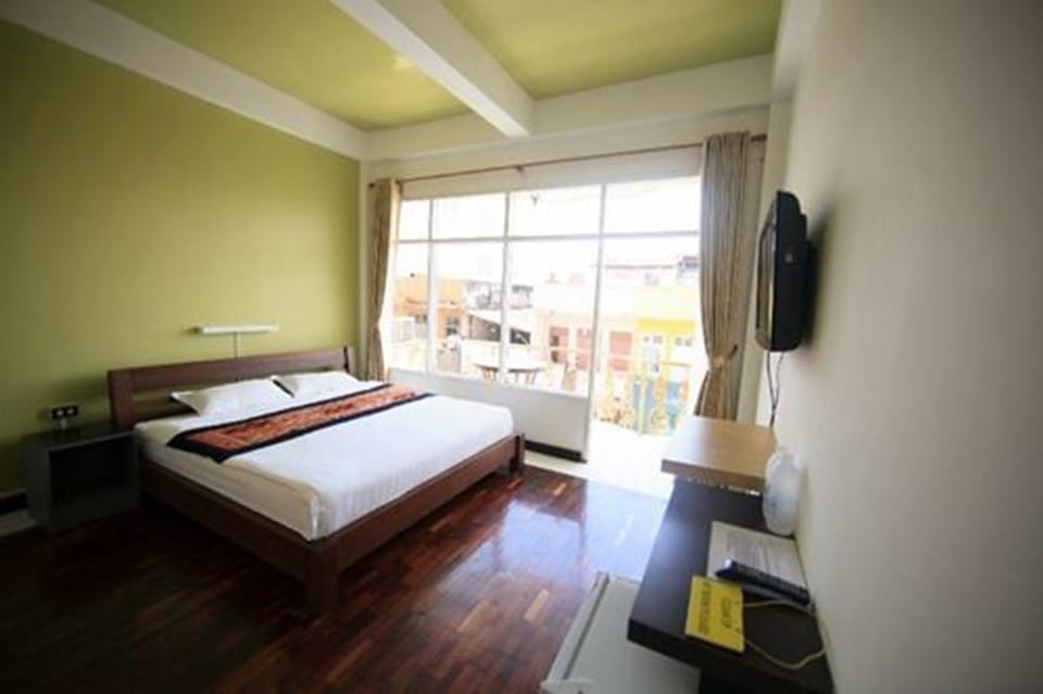 Deluxe Room, Balcony, City View | Desk, free WiFi