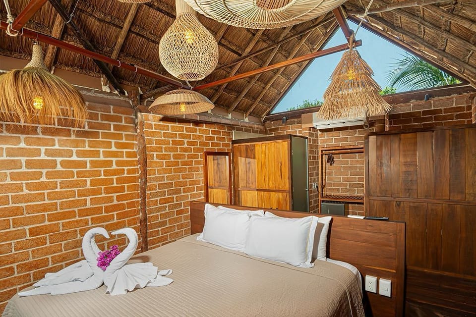 Cottage, 1 King Bed | 1 bedroom, blackout drapes, iron/ironing board, free WiFi