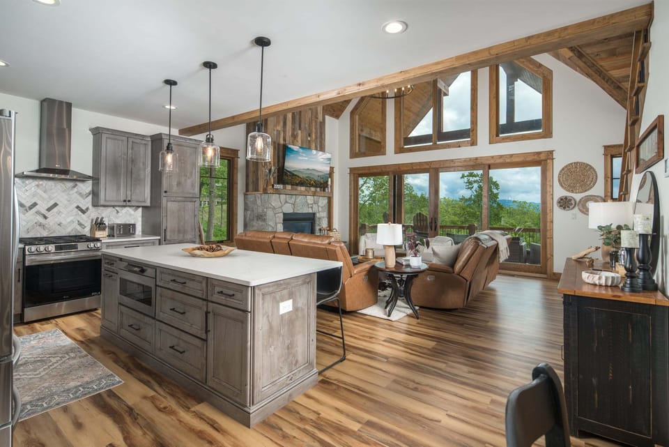 Open-concept kitchen and living area with mountain views in Eagles Nest