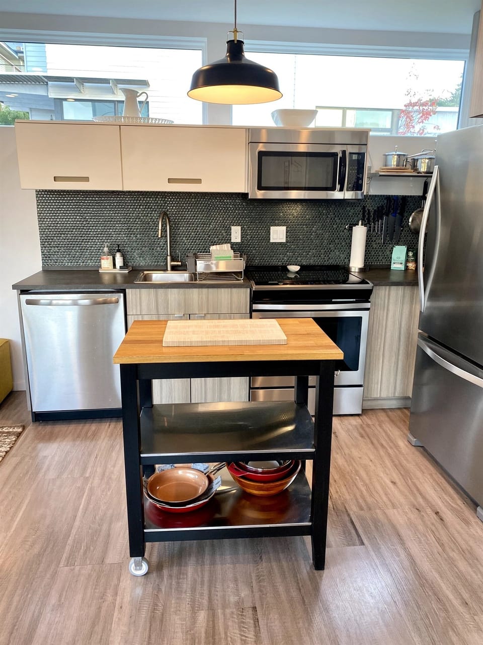 The kitchen is equipped with modern appliances and plenty of tools and conveniences. We have all the coffee options you'd ever want (A French press, a drip coffee maker, an Aero Press, and a coffee grinder.)