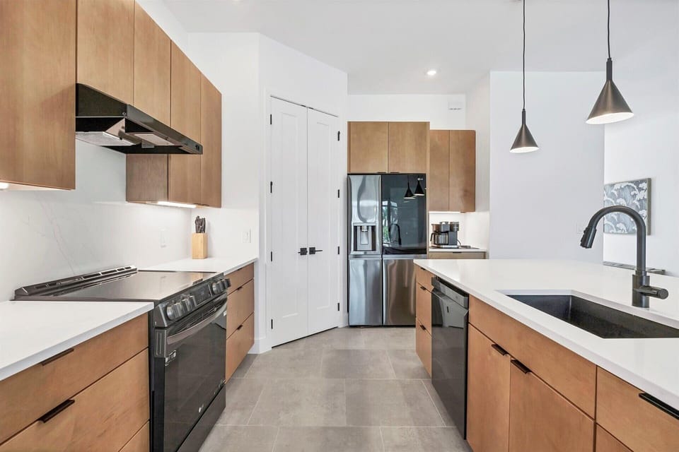 Beautiful, fully-equipped kitchen with brand new appliances. Kitchen island seats 4