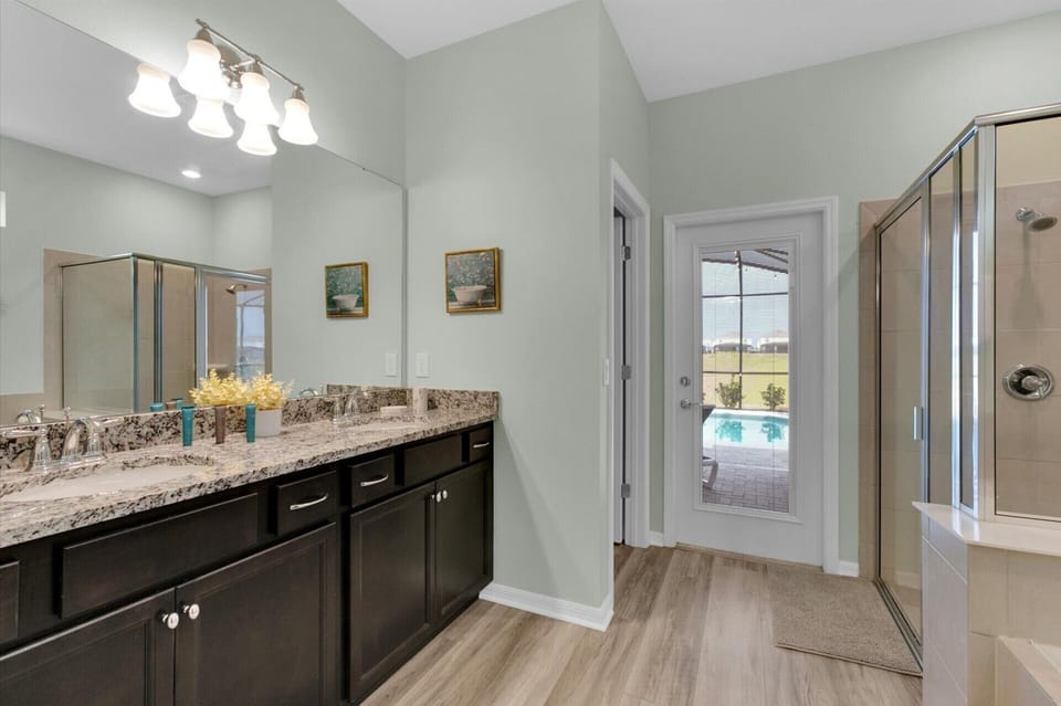 Master Suite 1, Shower and Tub, Downstairs, Door to Pool Deck