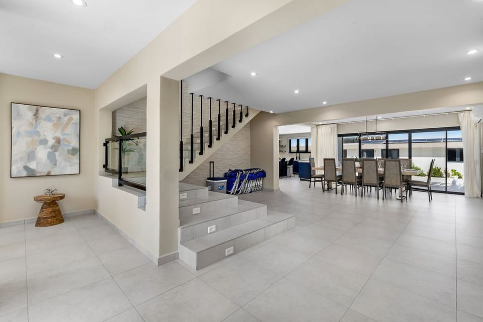 Step into sophistication with our sleek staircase, connecting the villa’s luxurious spaces with effortless style and charm