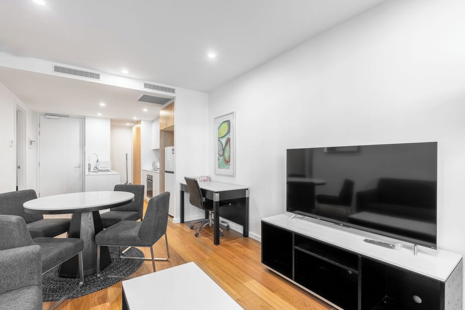 Economy Apartment | Living area | TV